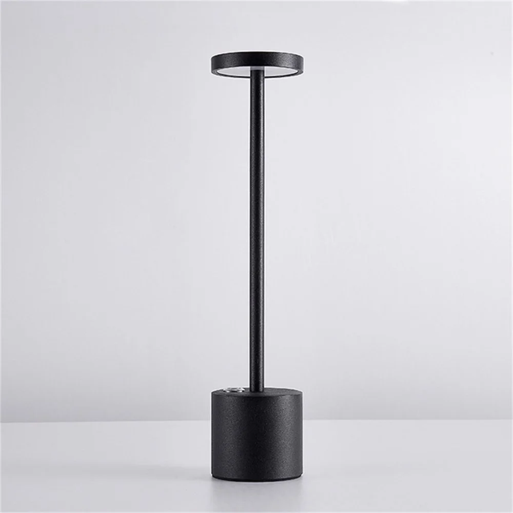 Black JB-TD003 table lamp with a slim stem and circular shade